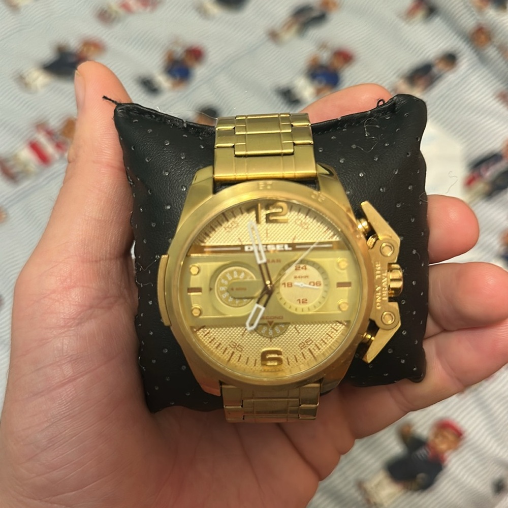 DIESEL iconic gold heavy watch 2016